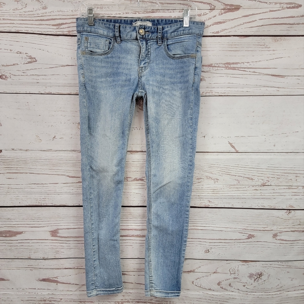 Free People light wash low rise skinny jeans